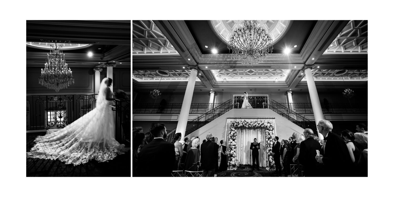 black and white image of the bride as she walks down the grand staircase during her indoor wedding ceremony at the palace at Somerset Park 