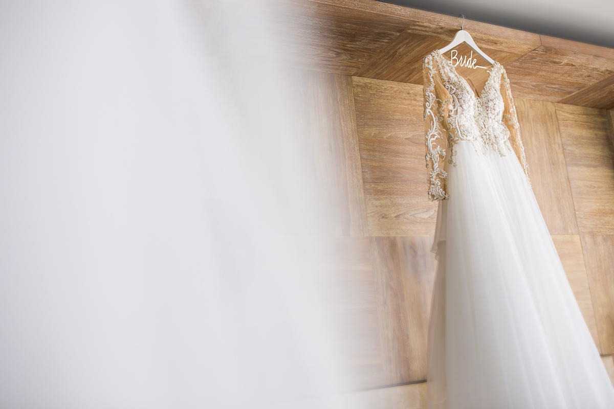 brides custom designed wedding dress in canopy by Hilton in the wharf in Washington dc 