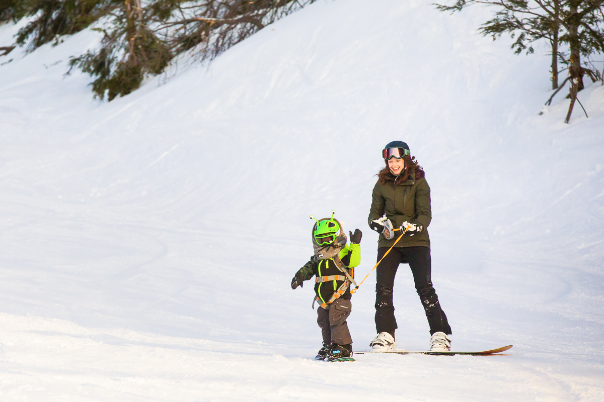 snowboarding mom child blue mountain resort