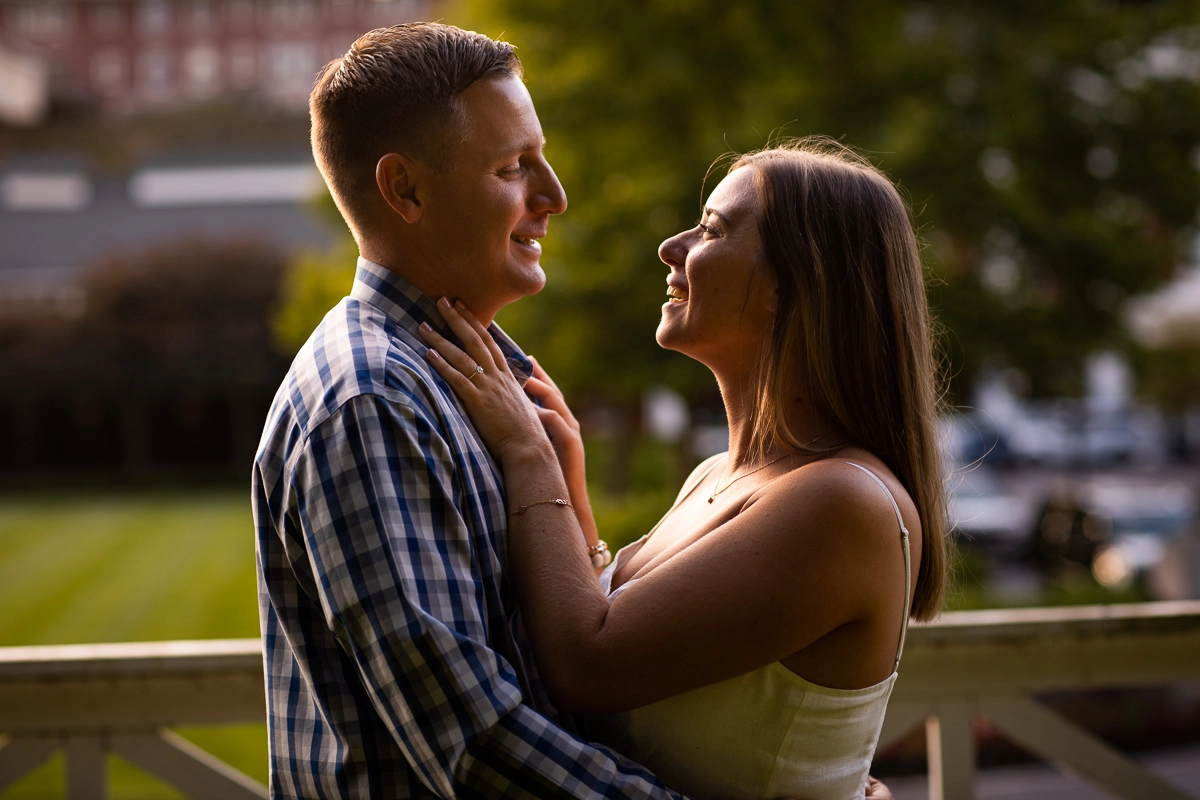 creative artistic best central pa engagement photographer omni resort couple holding each other looking at each other smiling