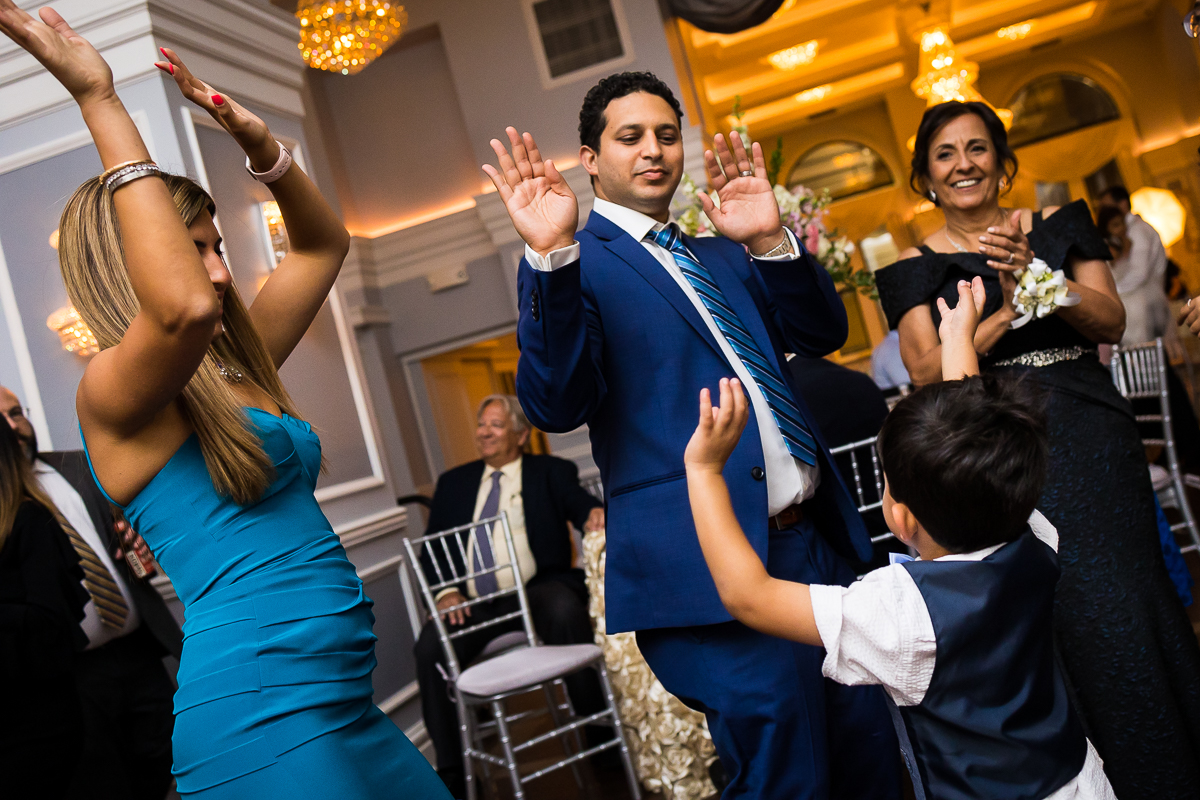 wedding guests dancing during reception at the arts ballroom