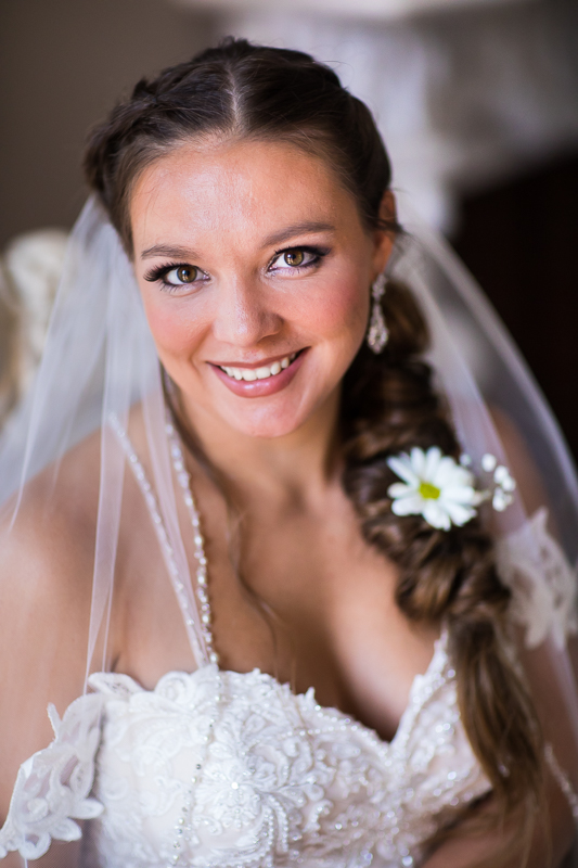 best award winning wedding photographer central pa traditional bridal portrait bride with flower braid smiling wearing veil and wedding dress