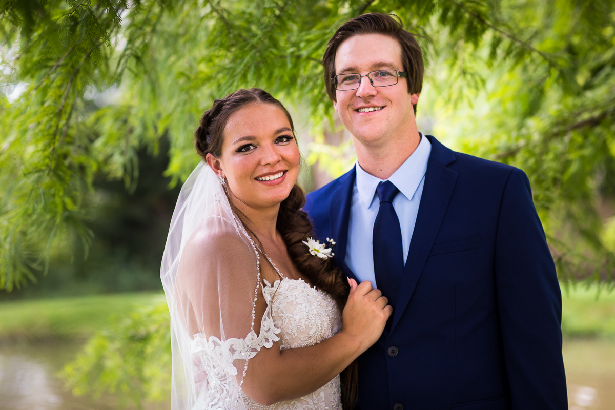 best vibrant traditional wedding photographer central pa award winning bride and groom smiling looking at camera