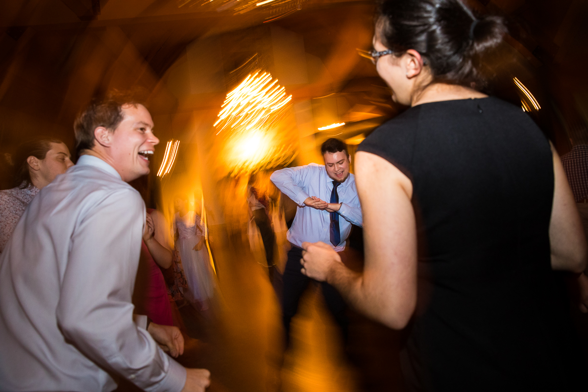 guests dancing inside during wedding reception at historic acres of Hershey