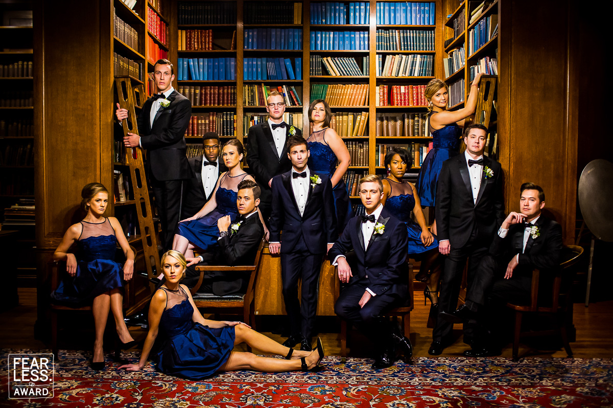Traditional wedding party group photo with a vogue editorial vibe with black tuxes and royal blue dresses which won a Fearless Photographer Award for Lisa Rhinehart Photography one of the Best wedding photographers in the USA and one fo the best wedding photographers in dc 