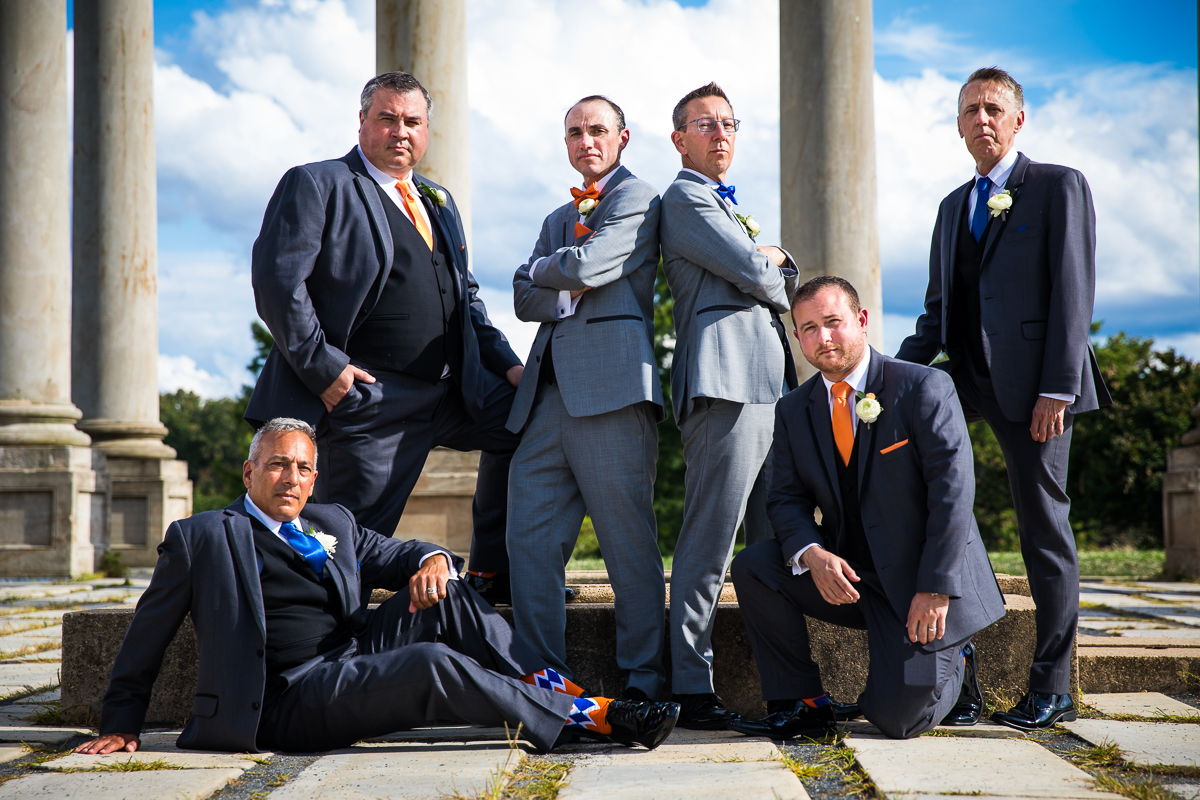 National Capitol Columns wedding photographer DC grooms and groomsmen pose vogue style wedding portraits