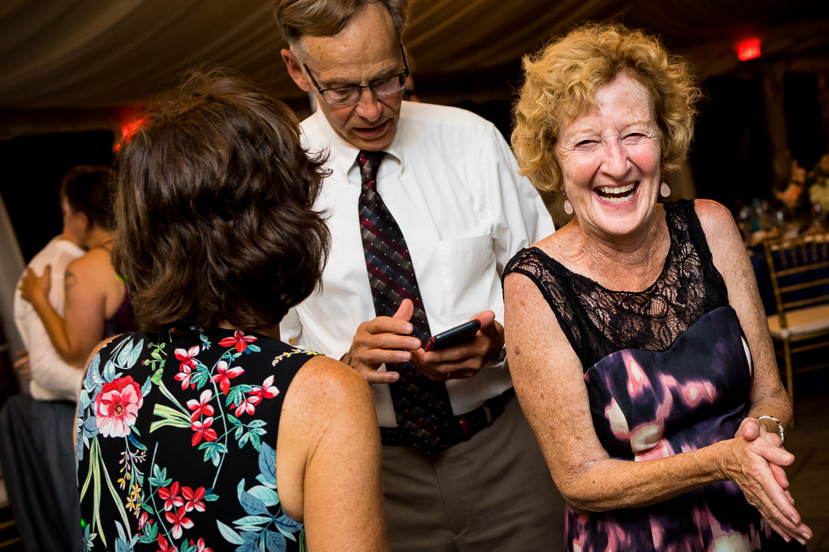 best Alexandria va wedding photographer river farm guest smile and dance during reception
