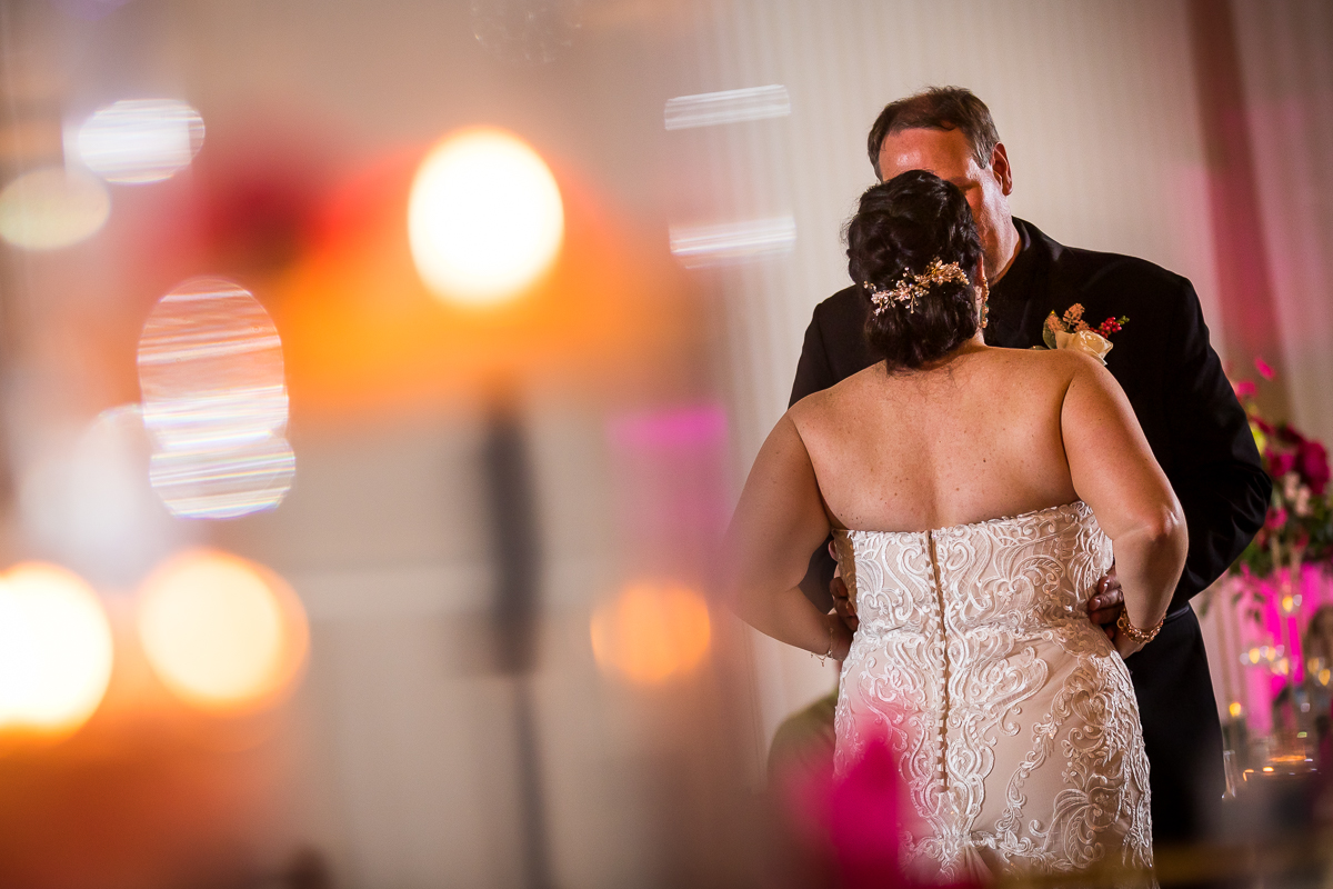 award winning artistic creative wedding photographer bride and groom share first dance at gettysburg hotel wedding reception