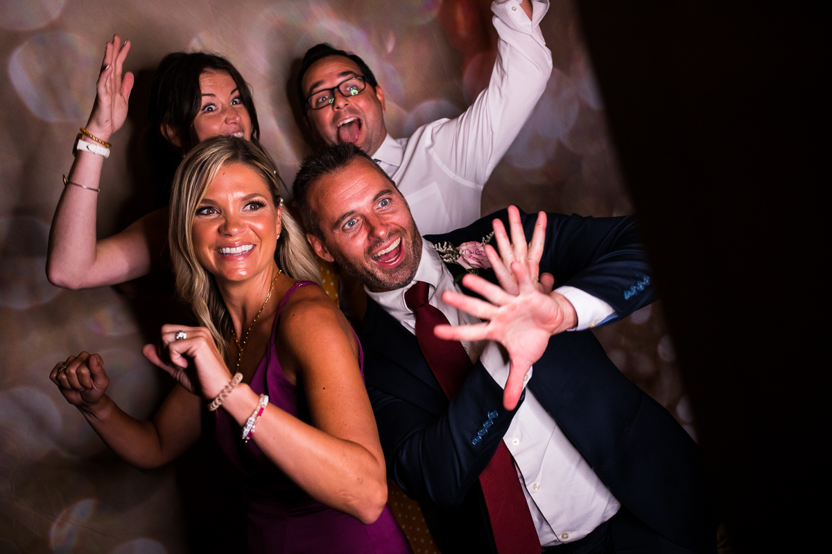 wedding guests having fun at Photo Booth at stroudsmoor country inn 