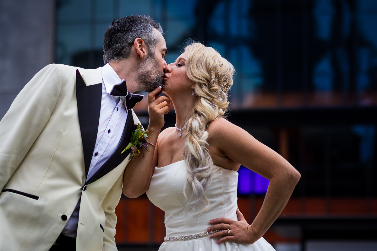 best award winning wedding photographer bride and groom share kiss at steelstacks after-session