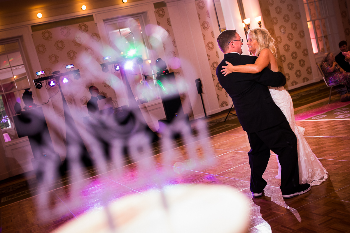 Omni Bedford Springs wedding photographer bride and groom share first dance together