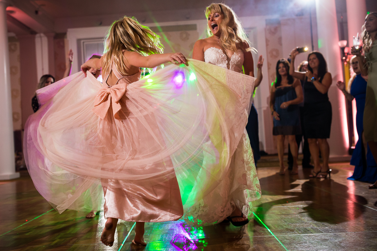 bride and great niece dance together at wedding reception
