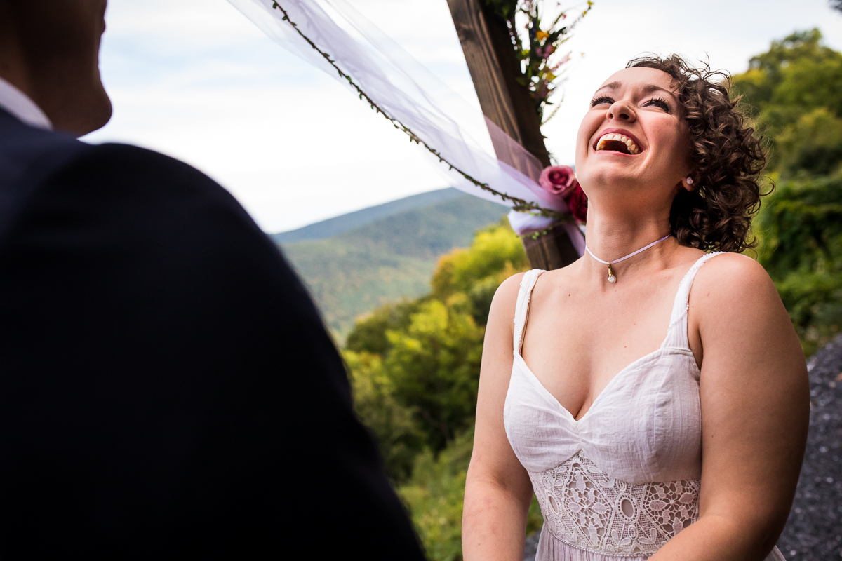 raystown lake joyful wedding photographer bride laughing 