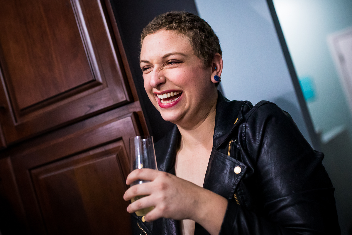wedding guest laughing during toasts