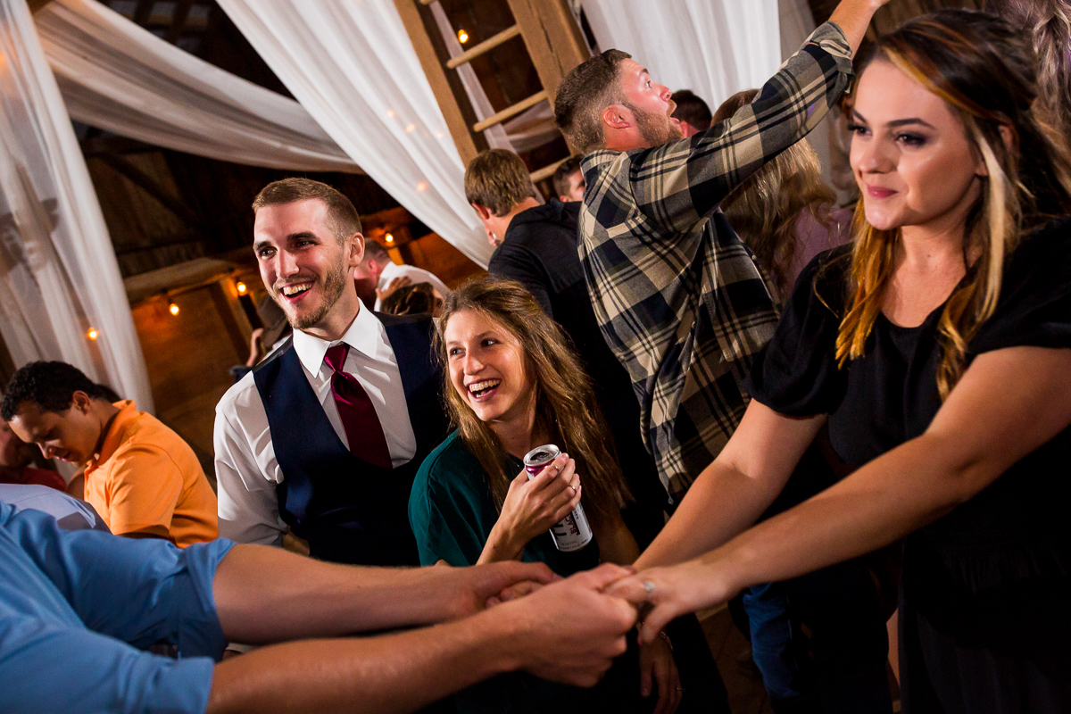 guests dancing having great time emotional real life photographer