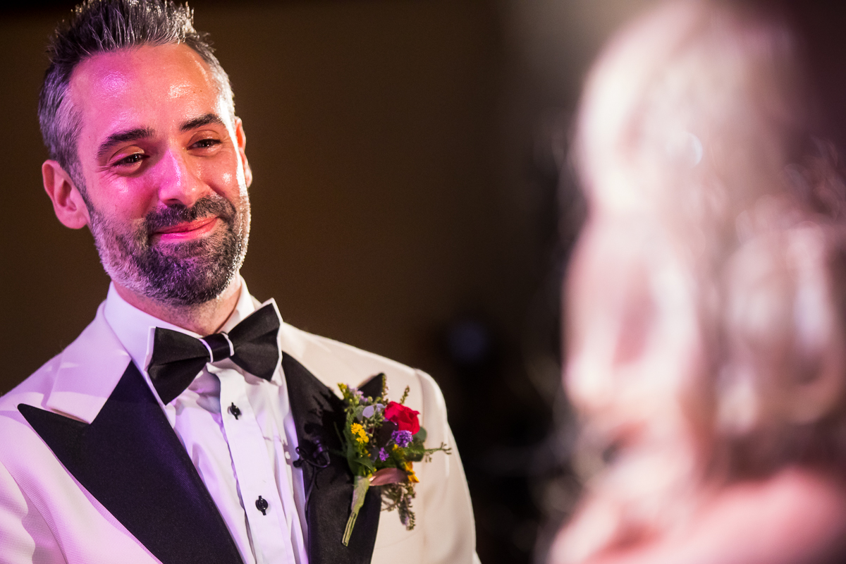 groom with tears in eye when meeting wife at altar best Lehigh Valley wedding photographer