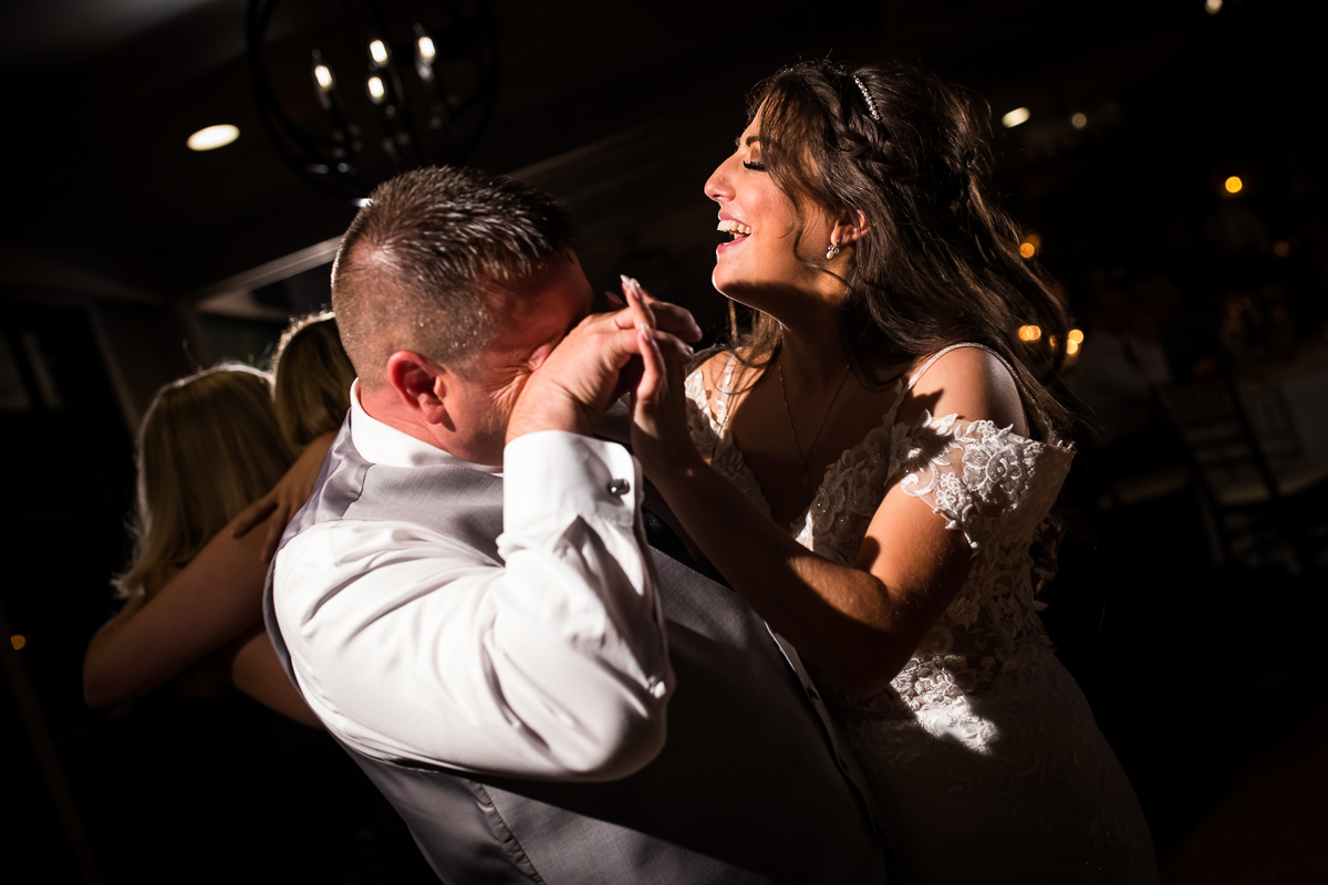 bride dancing with family emotional candid authentic wedding photographer 