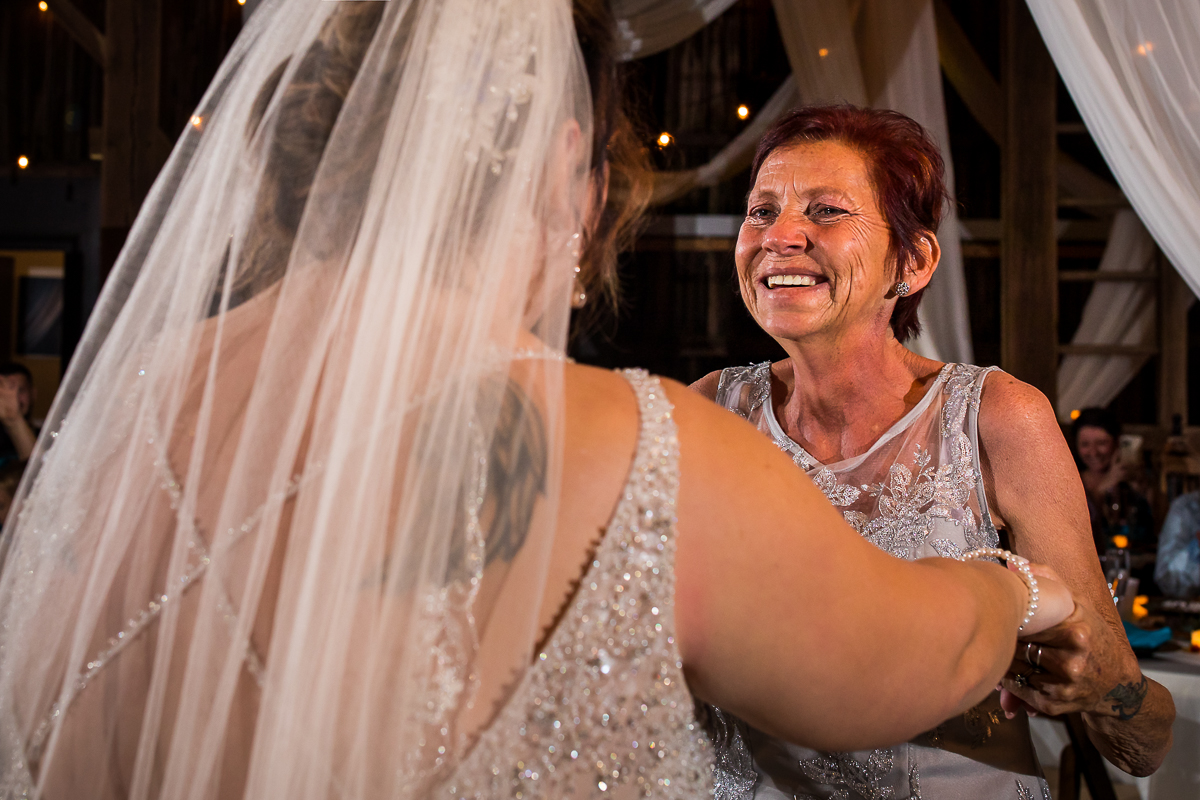 bride dancing with mom during wedding reception heritage restored