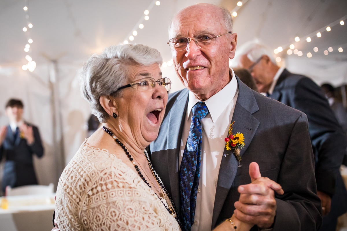 couple wins anniversary dance during wedding reception surprised happy look
