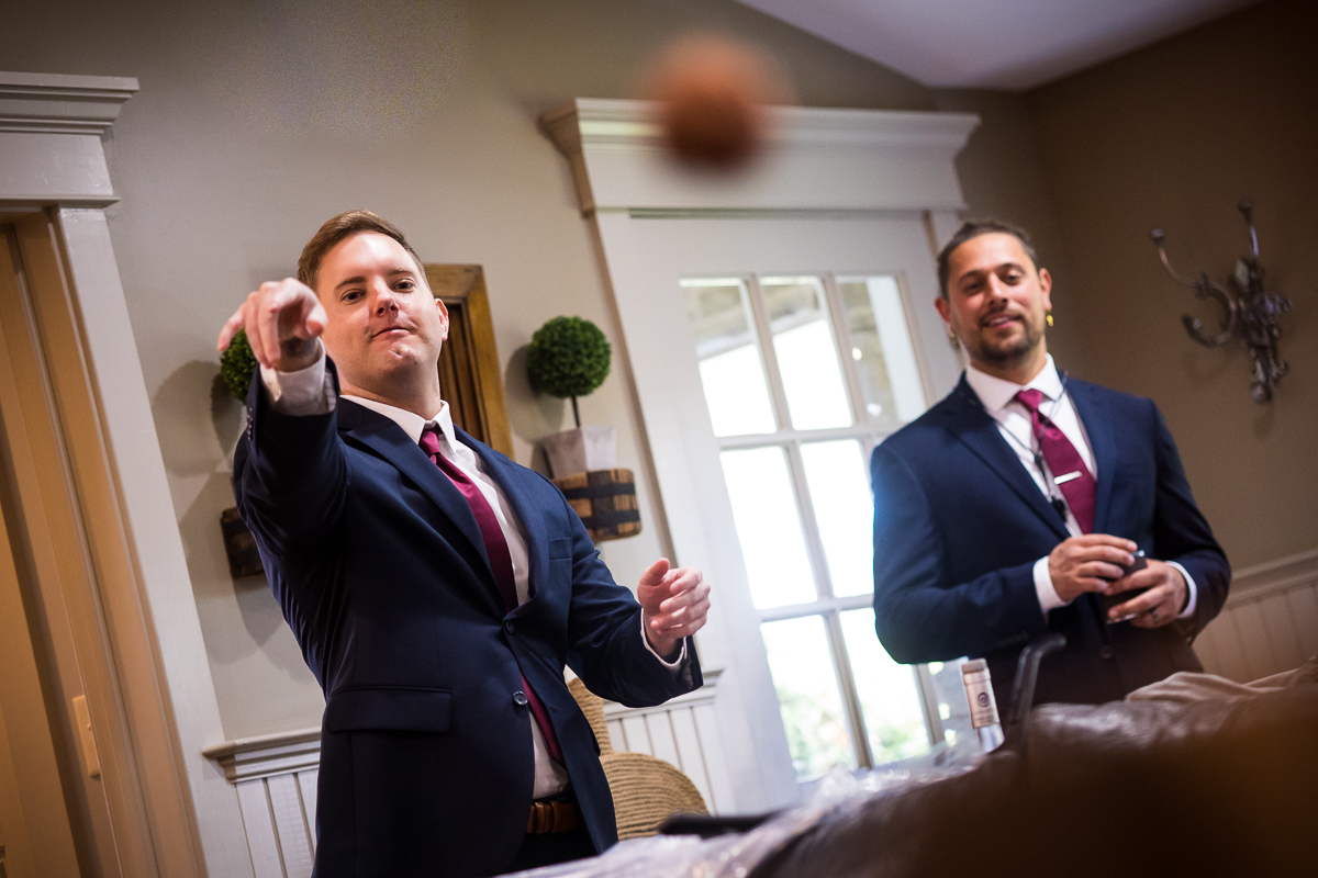 groomsmen playing games during getting ready