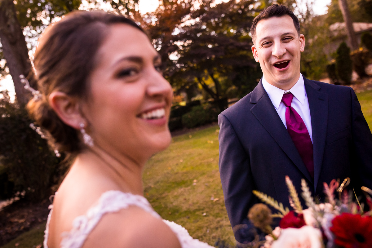 groom reacting to bride during first look fun creative central pa wedding photographer