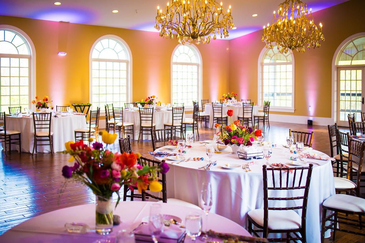 vibrant, colorful, image of the reception decor and venue for this linwood estate wedding reception 