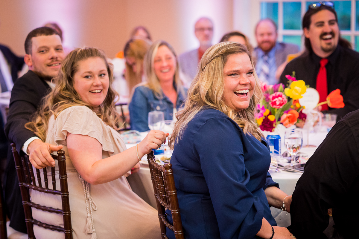 image of guests laughing and smiling during this wedding reception in carlisle pa