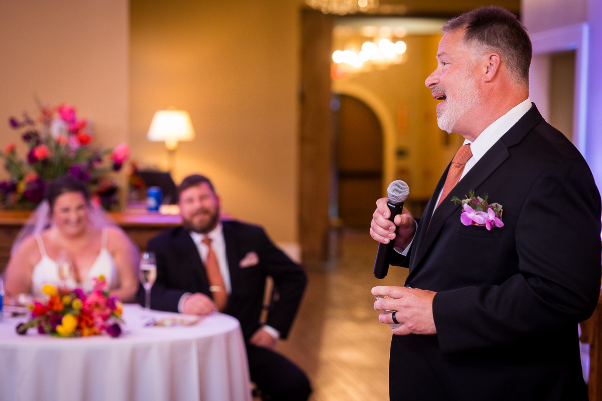 image of a groomsman giving a speech during this wedding reception
