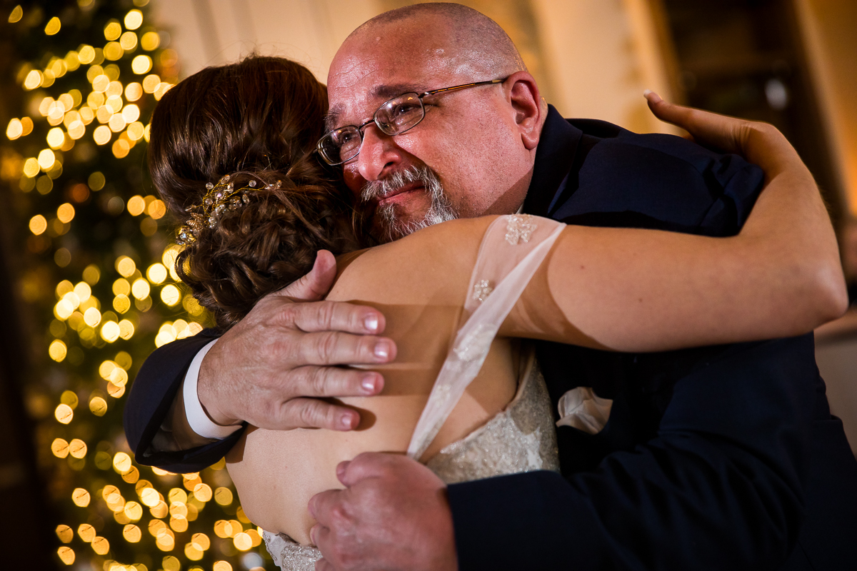 photo of the bride and her dad dancing together and hugging one another during their liberty mountain wedding reception