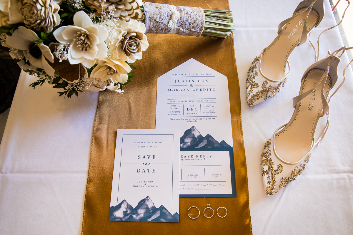 Detail photos of the invitation, handmade bouquets, shoes and rings taken by central pa wedding photographer Lisa Rhinehart