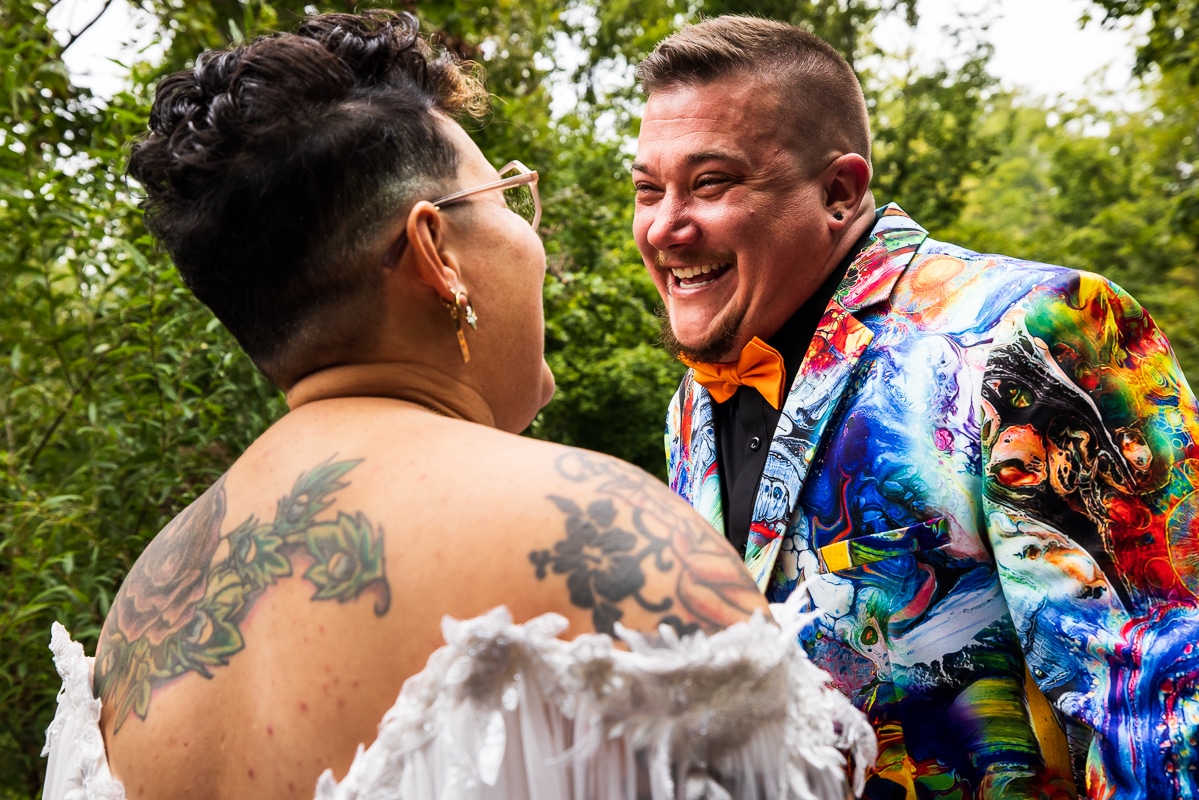 LGBTQIA+ Wedding Photographer, Lisa Rhinehart captures this couple's authentic emotions as they cry and laugh during their first look at Renfrew Park in Pennsylvania