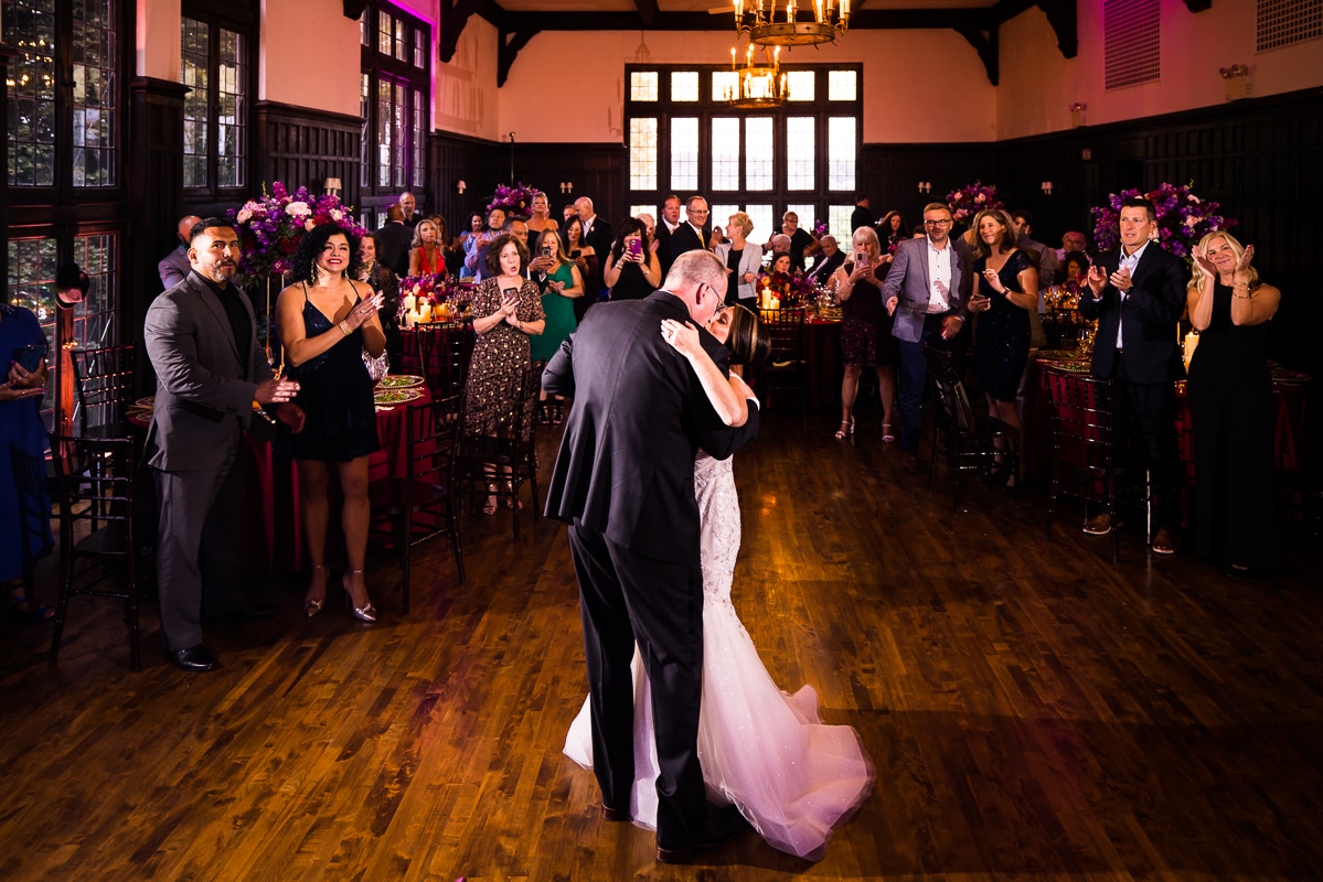 The bride and groom kissing during their first dance at their civic club of Harrisburg wedding reception