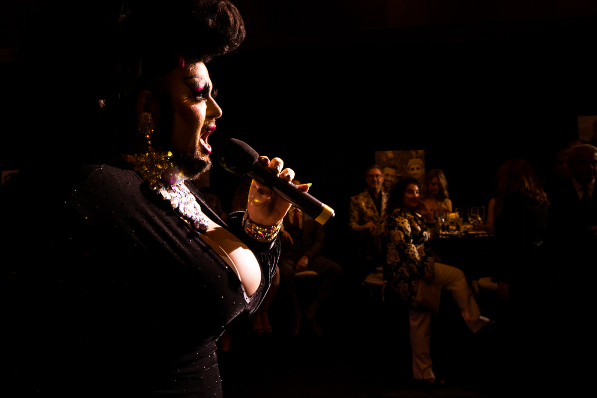 image of a drag queen singing during the wedding reception at the Phoenixville foundry 