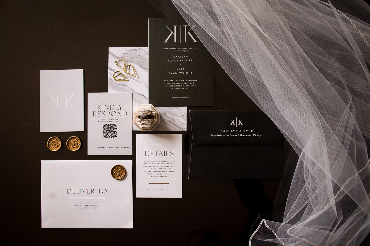 traditional detail photo of the stationary, rings, veil and more during the detail photos of this wedding at the ritz carlton
