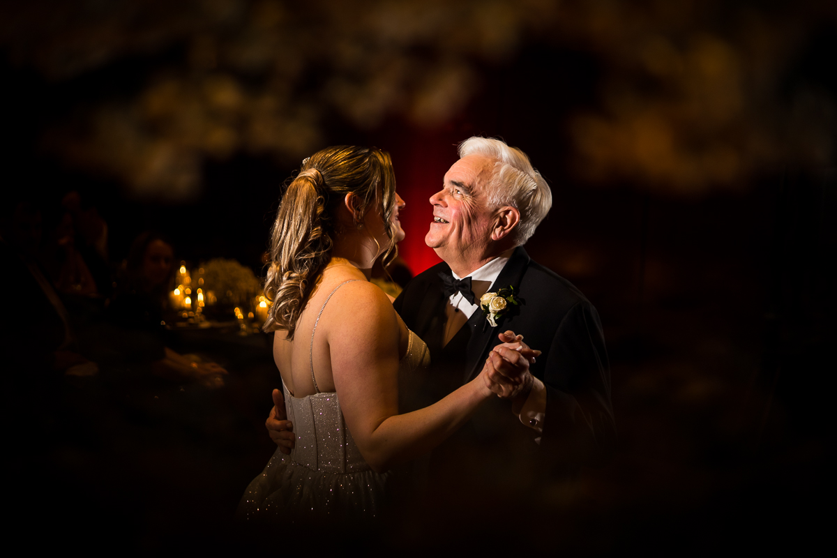 Ritz Carlton Georgetown Wedding photographers, rhinehart photography, captures this dark, dramatic, unique image of the bride dancing with her father at their wedding reception