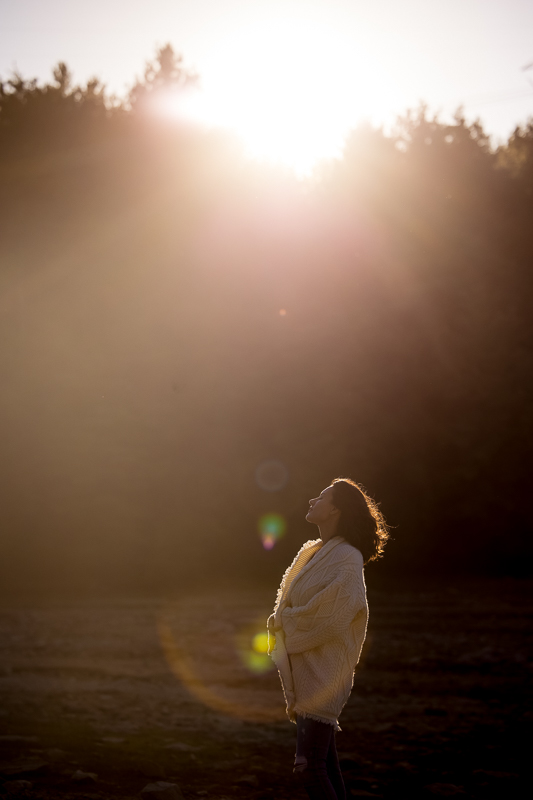 unique image of a girl walking around outside as the sun sets for her business branding photography session