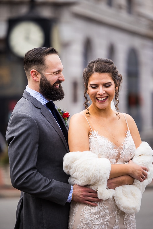 authentic, vibrant image of the bride and groom smiling and laughing before their Gettysburg Hotel Wedding 