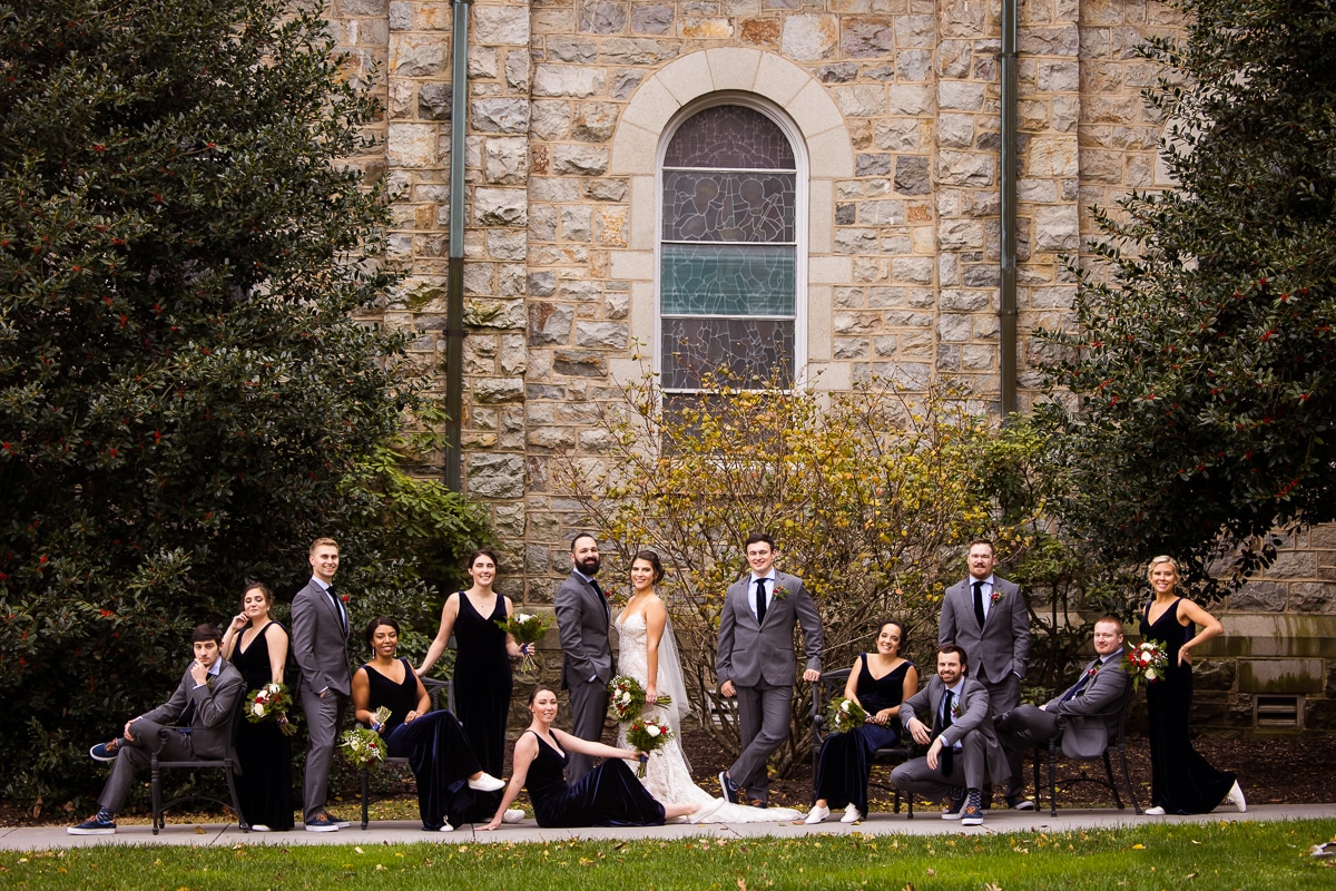 Gettysburg Hotel Wedding photographer, lisa rhinehart, captures the bride and groom with their wedding party outside of mount st mary's before their wedding ceremony at the chapel