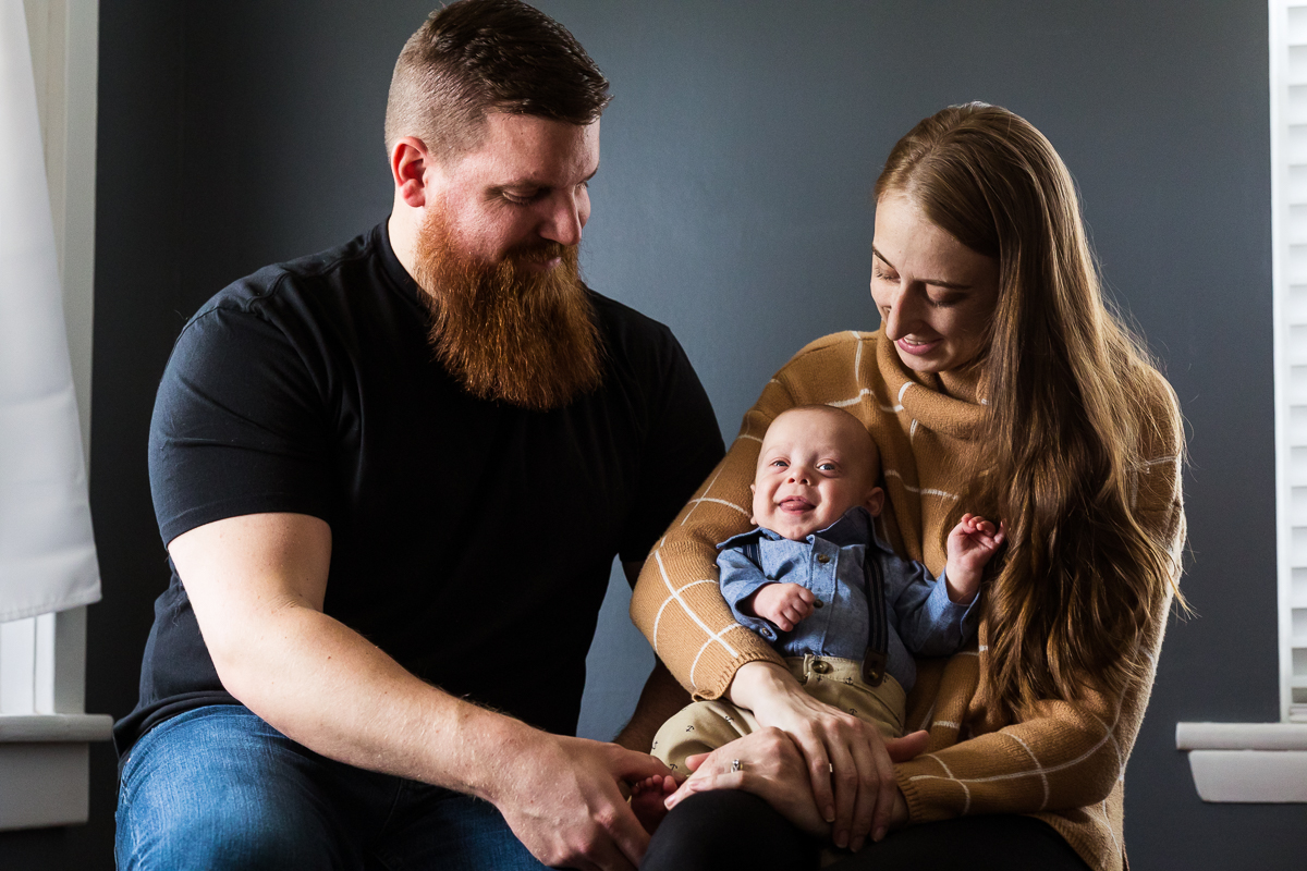Lehigh Valley Family Photographer, rhinehart photography, captures these authentic family portraits with their baby boy inside their home
