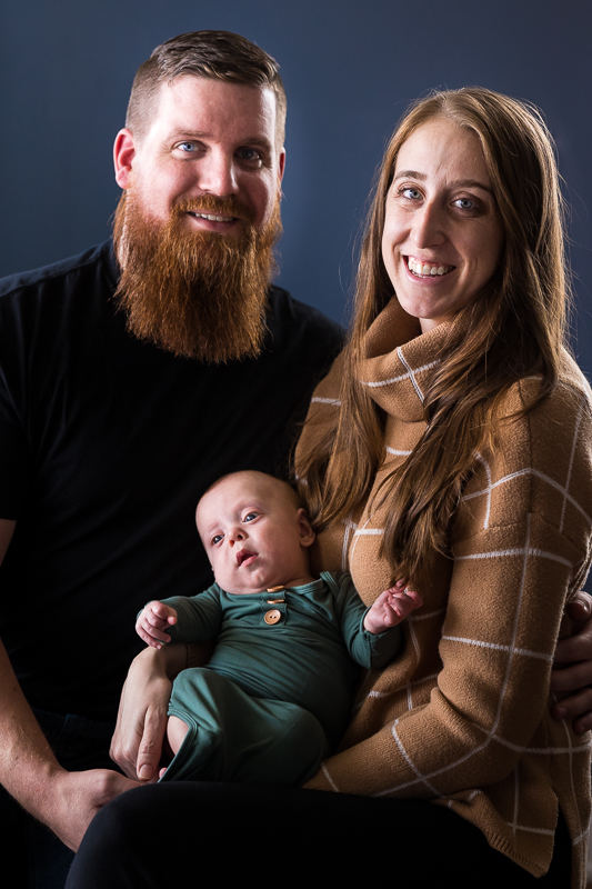 Rhinehart photography captures this traditional portrait of this family in their home during this newborn session