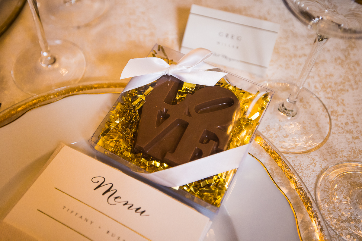 Wedding photographer, rhinehart photography, captures this close up detail photo of the favors giving to each guest at their reception