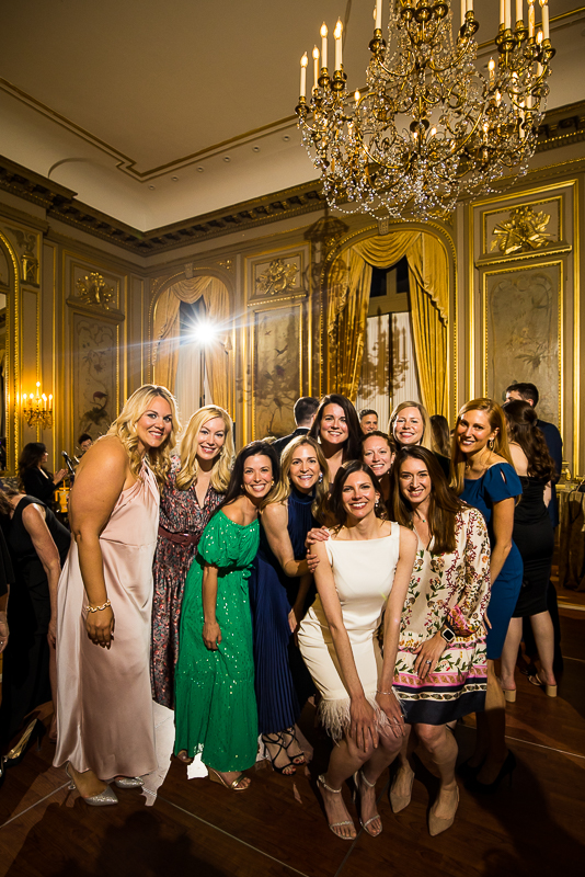traditional image of the bride with a group of her friends during her wedding reception in dc