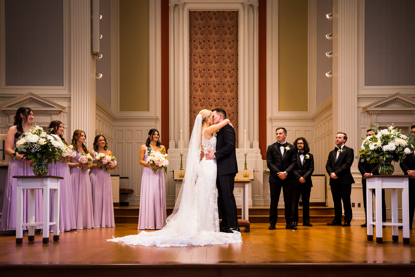 st pauls lutheran church wedding photographer, lisa rhinehart, captures the couples first kiss during their wedding ceremony