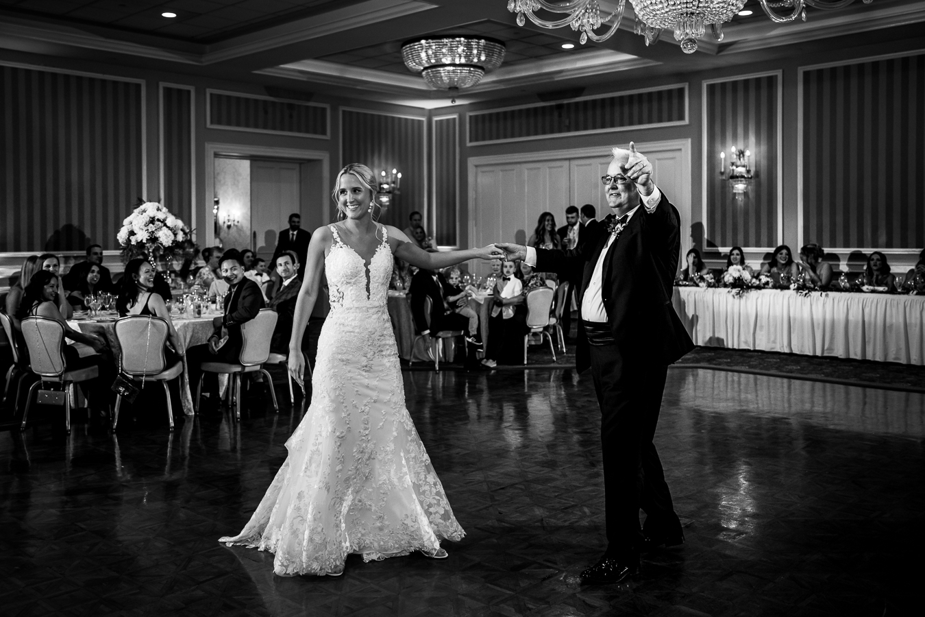 lisa rhinehart captures this black and white image of the bride and her father as they share their father daughter dance together at this Country Club of York Wedding reception
