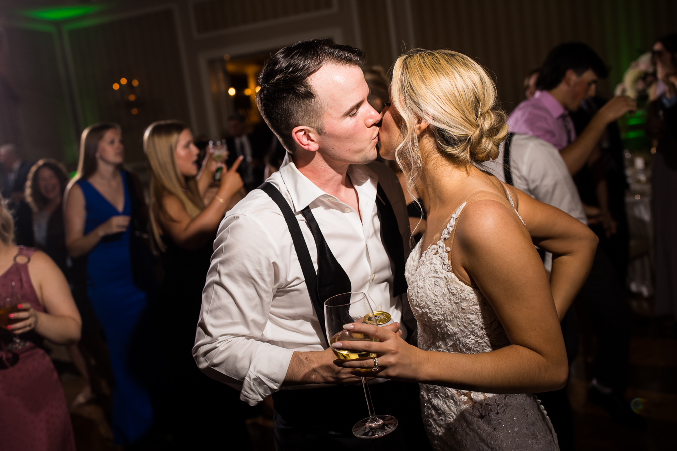 image of the bride and groom as they kiss on the dance floor during their country club of york wedding reception