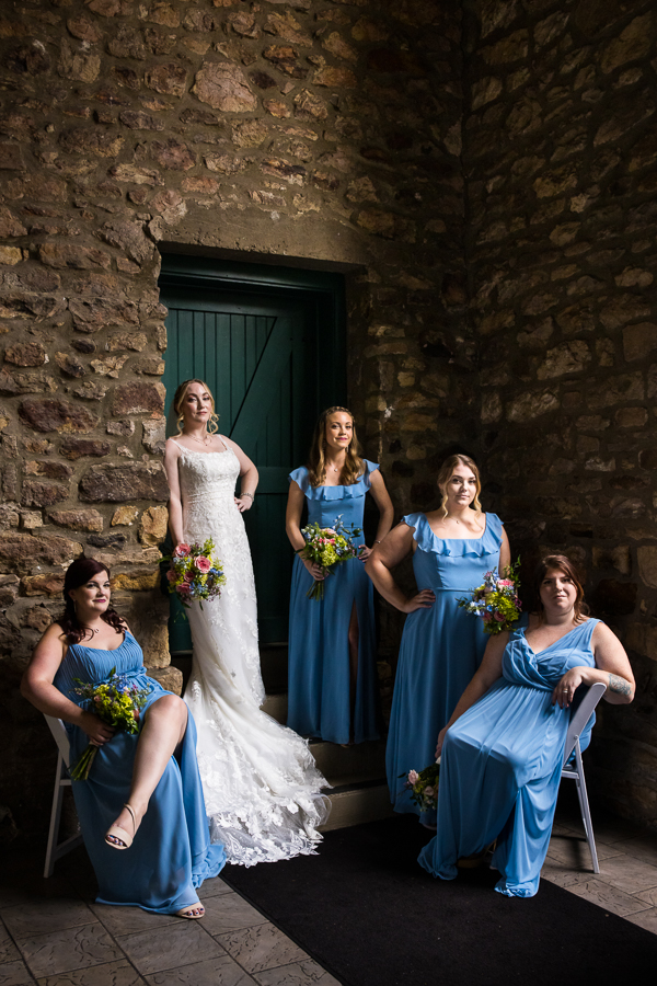 pa wedding photographer, lisa rhinehart, captures this unique image of the bride with her bridesmaids in a vogue style image