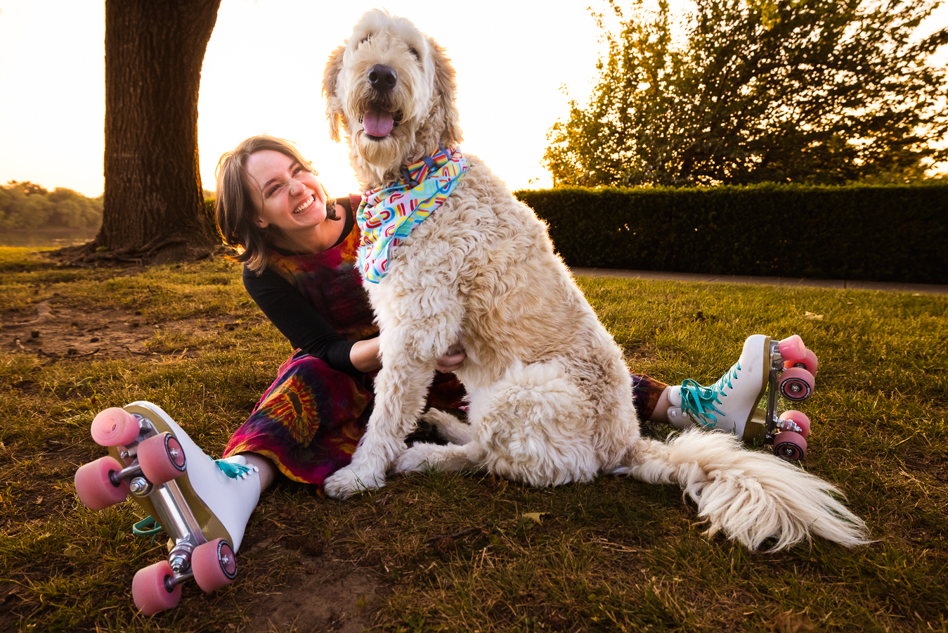 Fun, creative, vibrant image of this senior in her rollerskates with her big fluffy dog during this Creative Harrisburg Photography session 