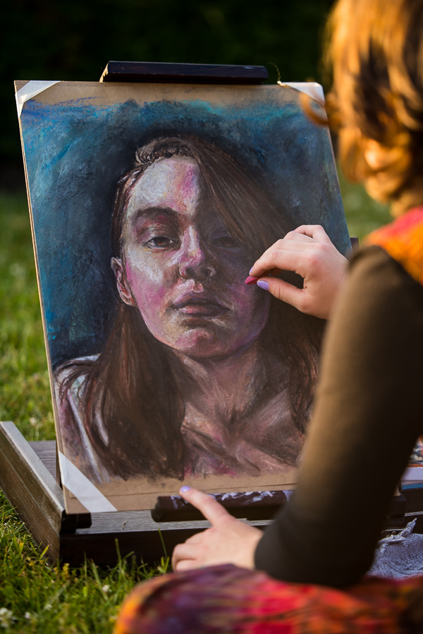 image of this artist as she creates and draws a self portrait during this Creative Harrisburg Photography session 