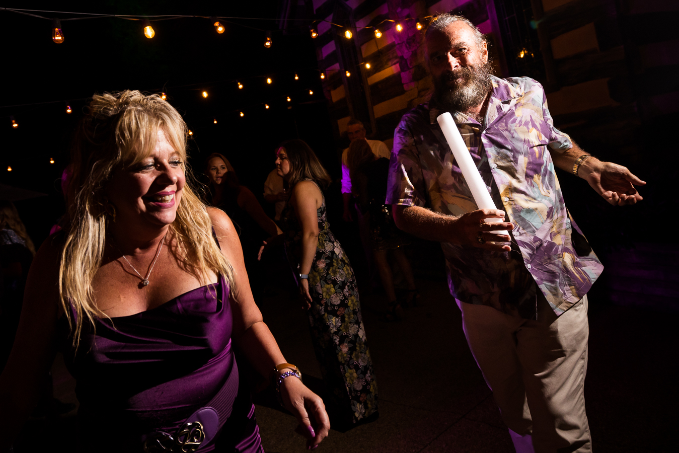 image of guests as they dance together during this wedding reception in stahlstown pa