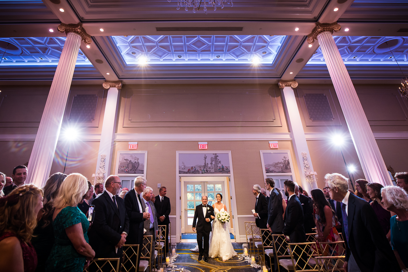 nj wedding photographer, lisa rhinehart, captures the moment that the bride walks down the aisle with her father at this palace at somerset wedding ceremony 
